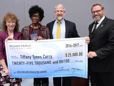 Tiffany Tynes Curry check dignitaries