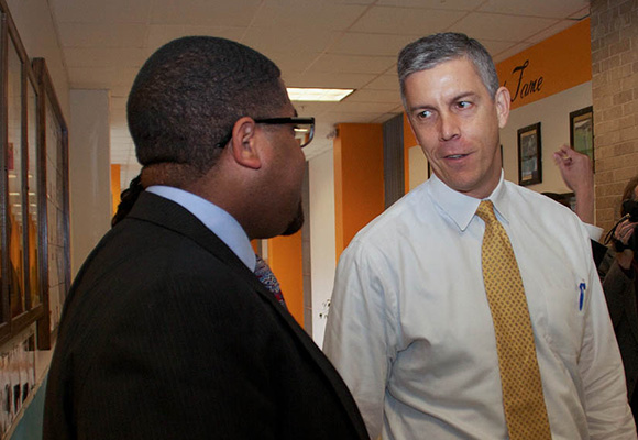 Dexter talks with U.S. Secretary of Education Arne Duncan during the Ambassador Teaching Fellowship.