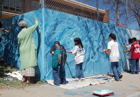 Brown attracts families with a true fine art mural done in collaboration with Guerilla Garden artist Jolt, funded by Denver’s Urban Arts Fund.