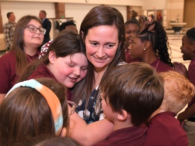 CIS ashley davis student hug