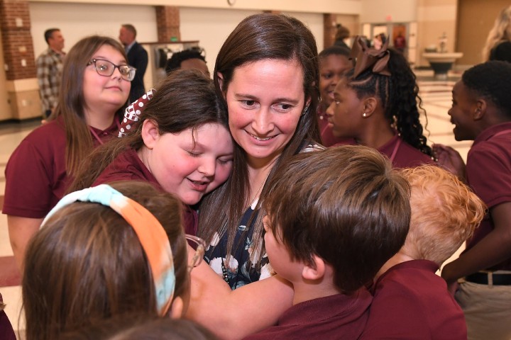 CIS ashley davis student hug