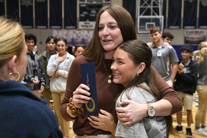 Kelly Ryan Student Hug