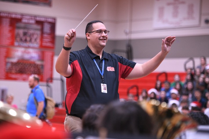 MMS Kyle Cook leading band