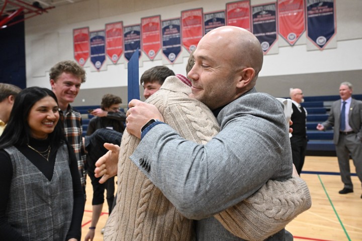 lchs chris reynolds hug