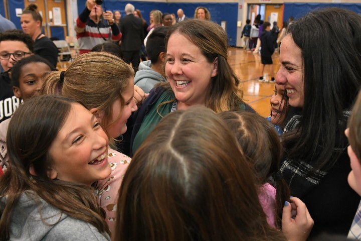 mn emily litz student hugs