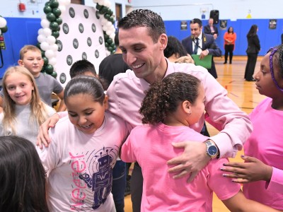 ts john melandro hugs students