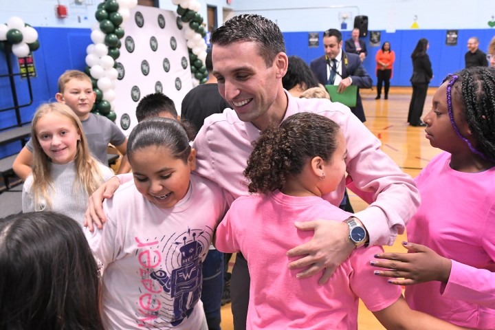 ts john melandro hugs students