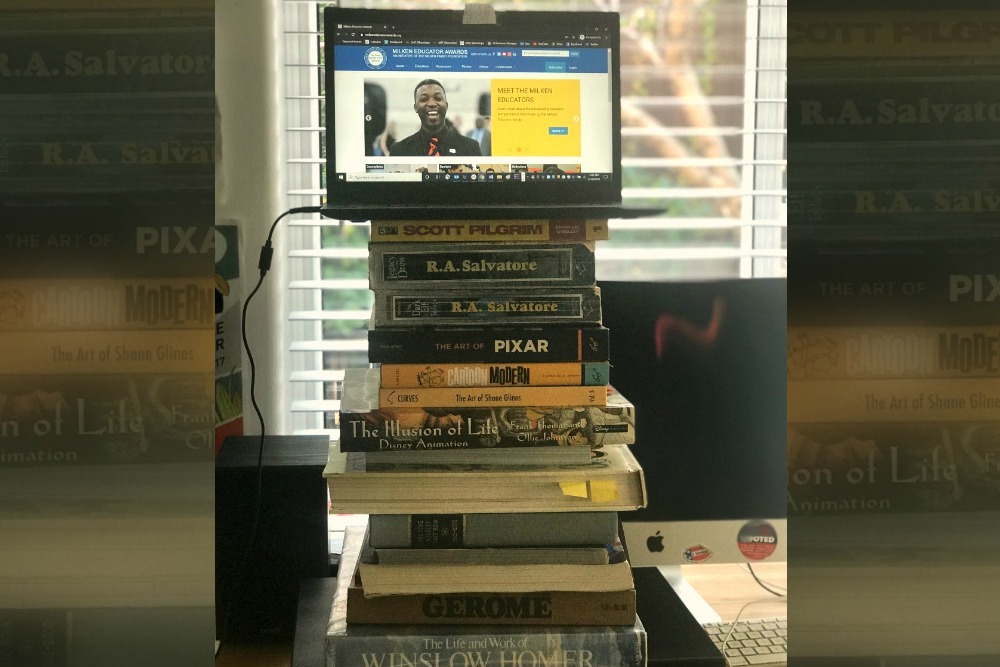 1000w Monitor on stack of books