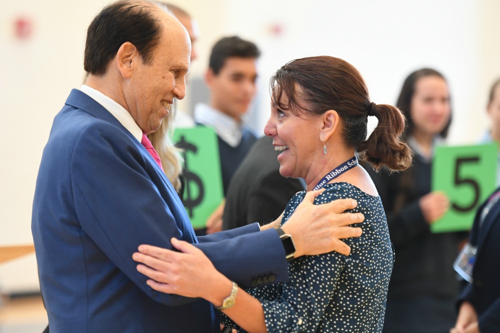 1000w Newark Charter 2017 Mike Milken congratulates Tami Lunsford