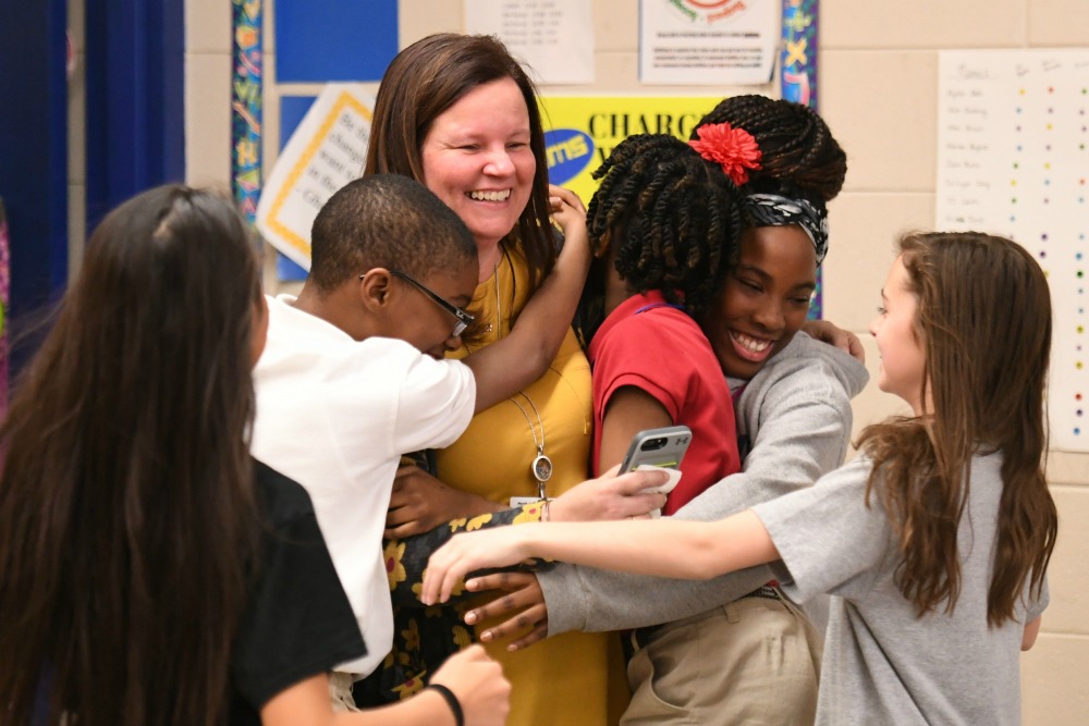 1000w North Little Rock 2017 Dawn McLain students hug 1