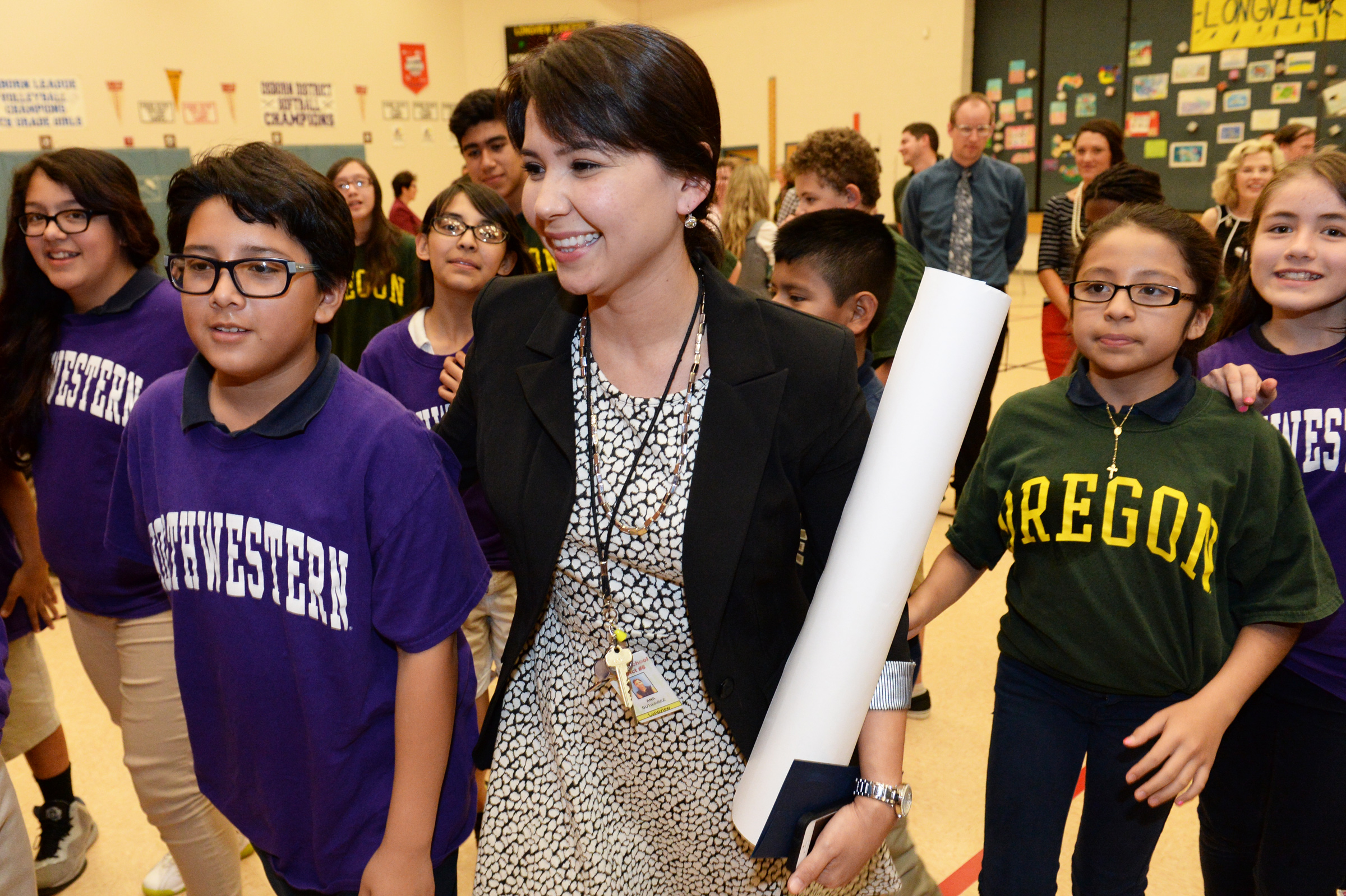 Ana Gutierrez walks with some of her students.