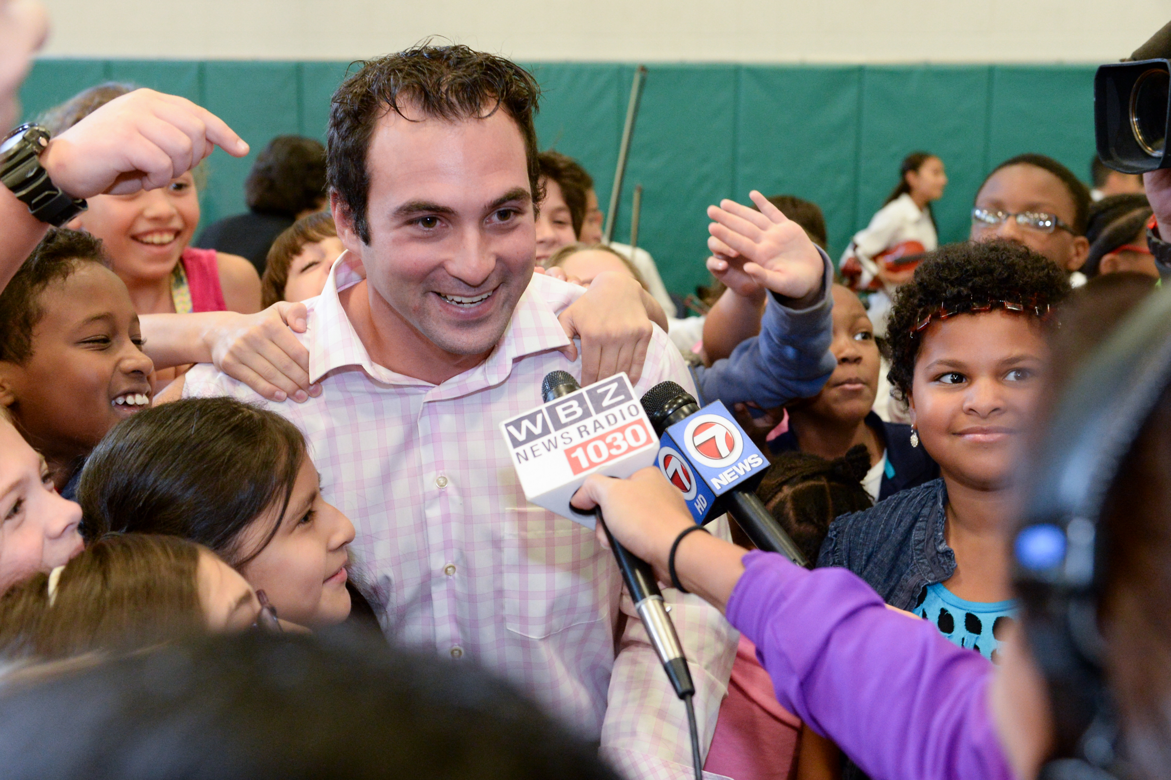 Anthony Petrelis gets some help talking to the media.