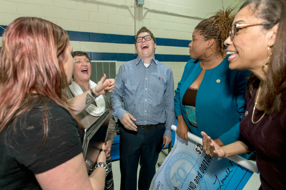 Eric Crouch laughs with colleagues 1000w