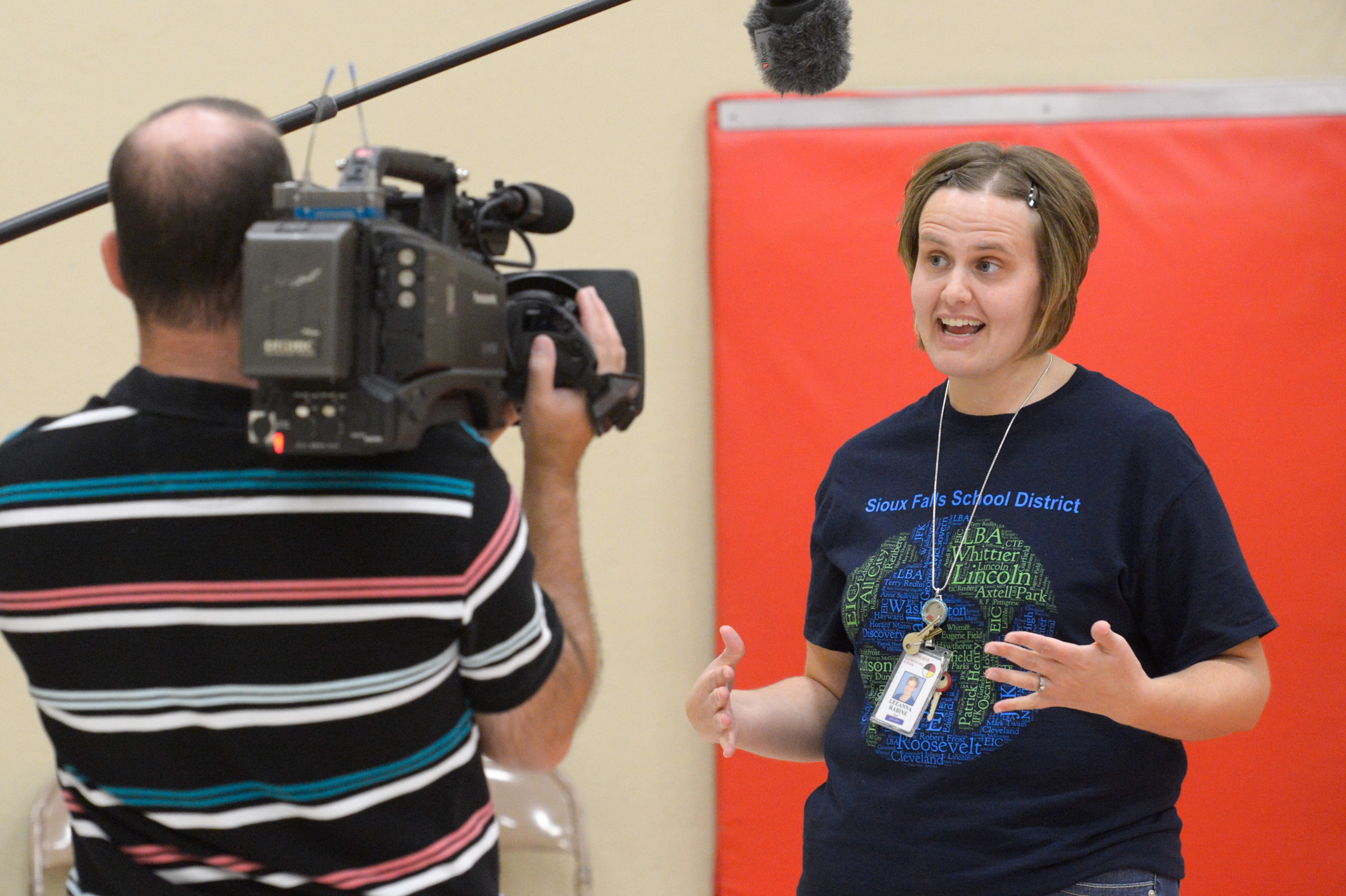 LeeAnna Rabine talks to the media.