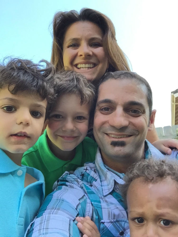 Nader Twal with his wife and children.