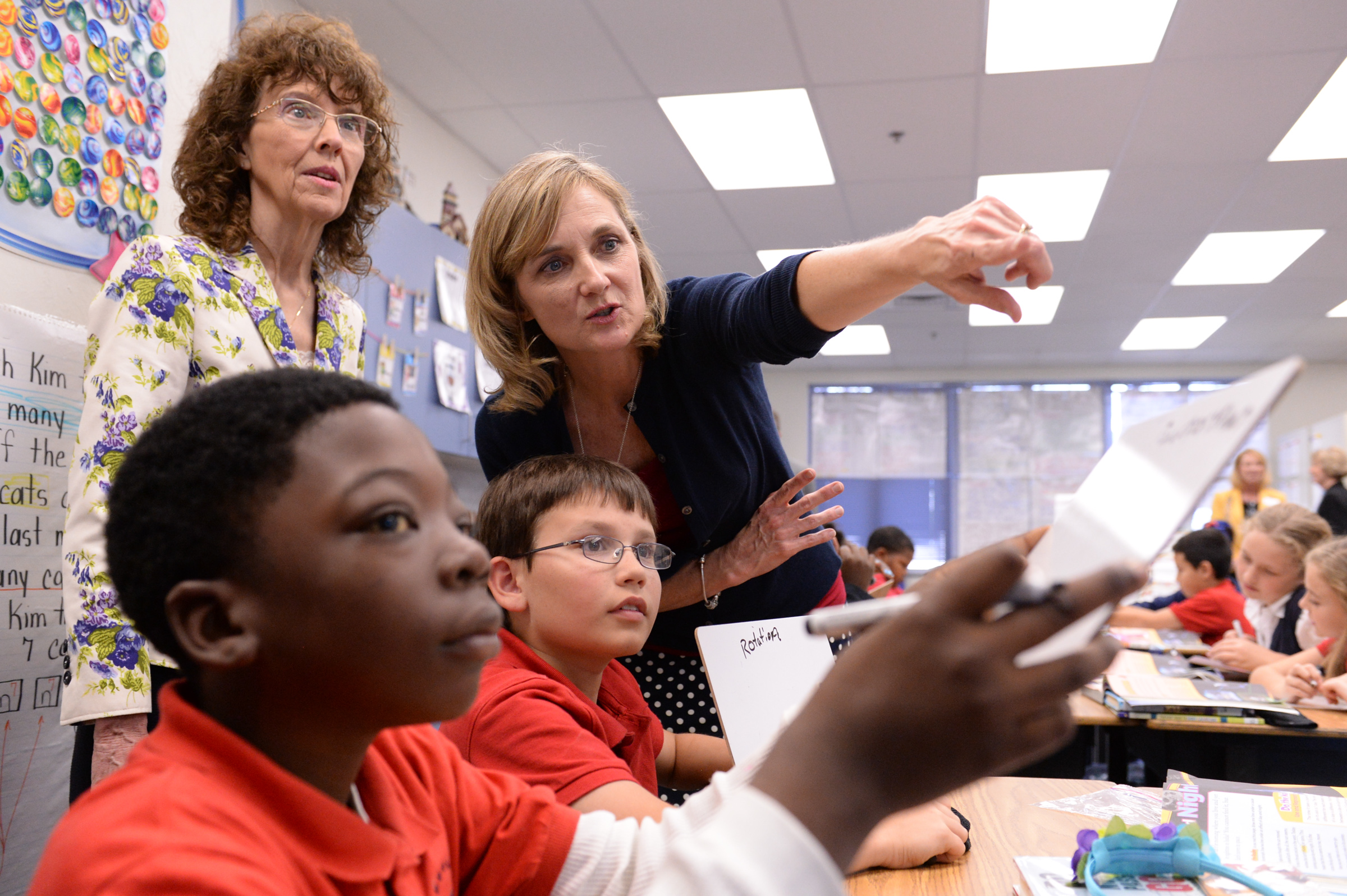 Nardi Routten makes a point to Milken Educator Awards Senior Vice President Jane Foley.